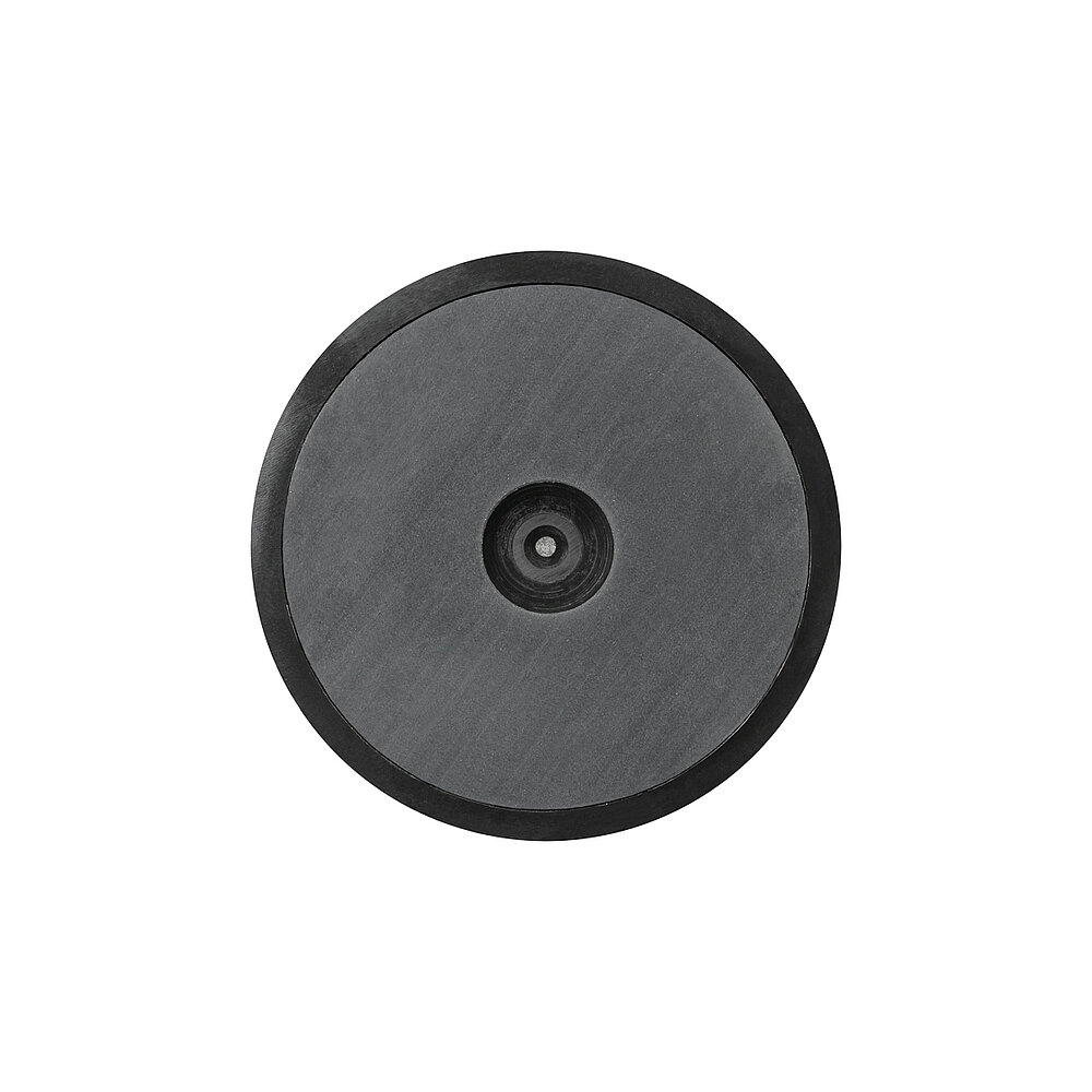 bottom view of a round screw-in action levelling foot for machinery and appliances, made of black polyamide, with 70 mm diameter and black NBR rubber pad for non-slip protection, isolated on white background