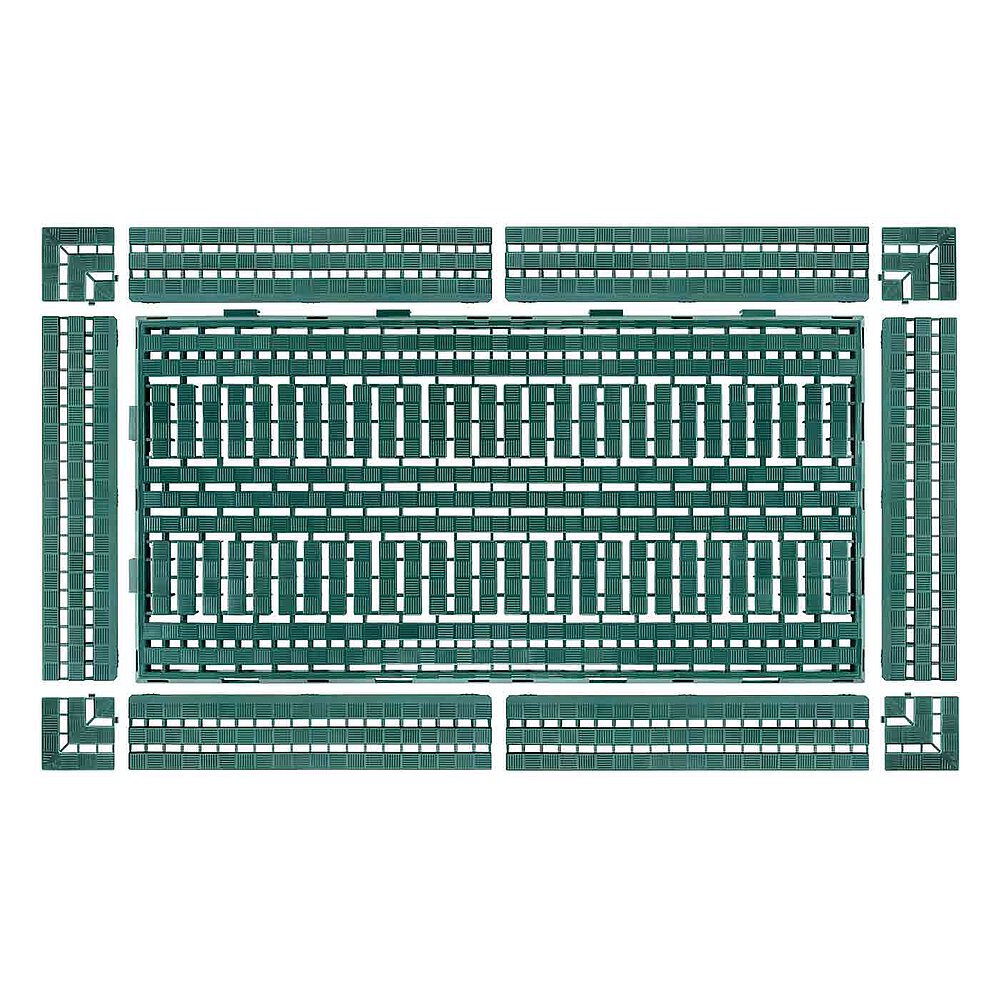 1 green rectangular floor-grating, made of plastics, with 6 rectangular ramp pieces and 4 square corner pieces, losely arranged, isolated on white background